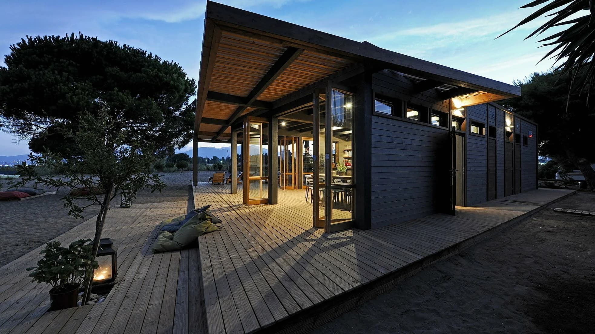 Wooden house by the beach Aravantinos daceworkshop